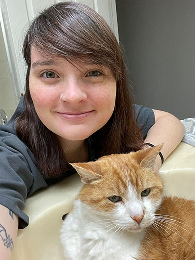 Cat sitter Lindsey with Nigel the cat